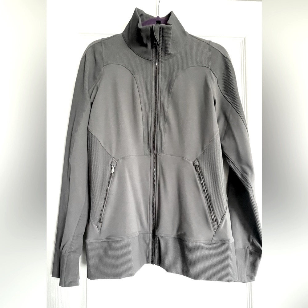 Lululemon size 12 Movement to Movement grey 
Zip up